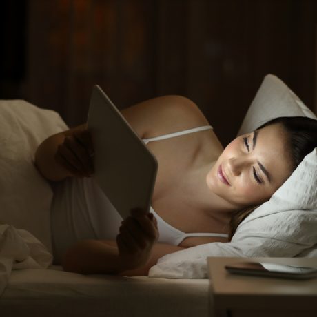 Relaxed,Girl,Using,A,Tablet,To,Watch,Media,Content,On Relaxed,Girl,Using,A,Tablet,To,Watch,Media,Content,On