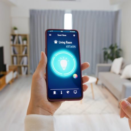 Asian,Young,Woman,Is,Using,Smart,Home,App,And,Touch