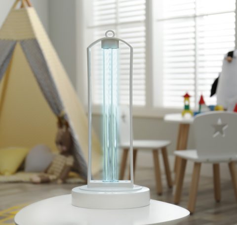 UV sterilizer lamp on table at home UV sterilizer lamp on table at home
